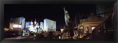 Framed Statue in front of a hotel, New York New York Hotel, Excalibur Hotel And Casino, The Las Vegas Strip, Las Vegas, Nevada, USA Print