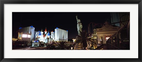 Framed Statue in front of a hotel, New York New York Hotel, Excalibur Hotel And Casino, The Las Vegas Strip, Las Vegas, Nevada, USA Print