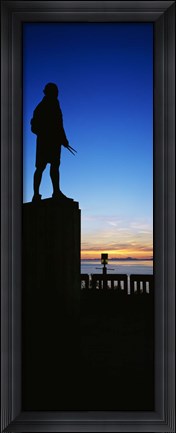 Framed Captain Cook monument silhouetted by sunset, Anchorage, Alaska, USA. Print
