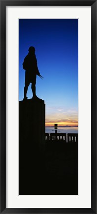 Framed Captain Cook monument silhouetted by sunset, Anchorage, Alaska, USA. Print