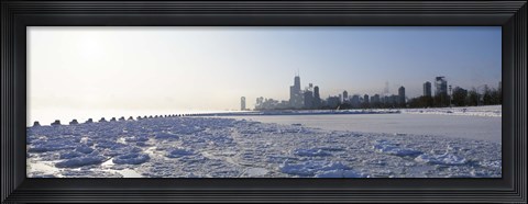 Framed Frozen lake with a city in the background, Lake Michigan, Chicago, Illinois Print