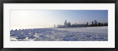 Framed Frozen lake with a city in the background, Lake Michigan, Chicago, Illinois Print