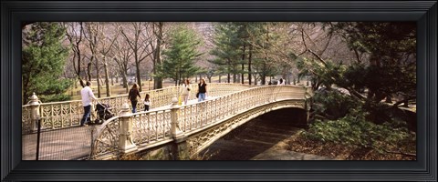 Framed Group of people walking on an arch bridge, Central Park, Manhattan, New York City, New York State, USA Print