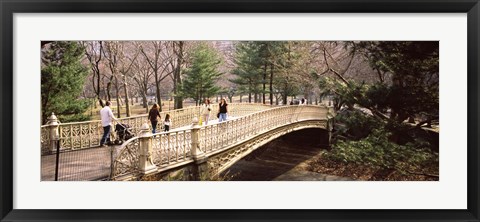 Framed Group of people walking on an arch bridge, Central Park, Manhattan, New York City, New York State, USA Print