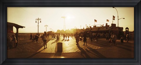 Framed Tourists walking on a boardwalk, Coney Island Boardwalk, Coney Island, Brooklyn, New York City, New York State, USA Print