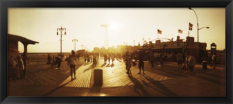 Framed Tourists walking on a boardwalk, Coney Island Boardwalk, Coney Island, Brooklyn, New York City, New York State, USA Print