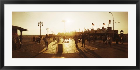 Framed Tourists walking on a boardwalk, Coney Island Boardwalk, Coney Island, Brooklyn, New York City, New York State, USA Print