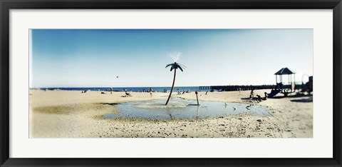 Framed Palm tree sprinkler on the beach, Coney Island, Brooklyn, New York City, New York State, USA Print