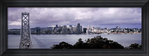 Framed Bridge across a bay with city skyline in the background, Bay Bridge, San Francisco Bay, San Francisco, California, USA Print