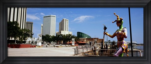 Framed Jester statue with buildings in the background, Riverwalk Area, New Orleans, Louisiana, USA Print