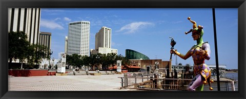 Framed Jester statue with buildings in the background, Riverwalk Area, New Orleans, Louisiana, USA Print