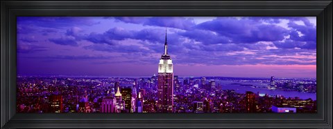 Framed Empire State Building lit up in white, Midtown Manhattan, New York City Print