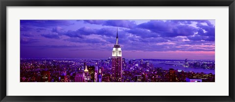 Framed Empire State Building lit up in white, Midtown Manhattan, New York City Print