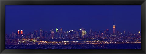 Framed Buildings in a city lit up at night, Upper Manhattan, Manhattan, New York City, New York State, USA Print