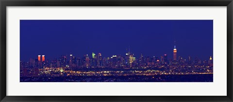 Framed Buildings in a city lit up at night, Upper Manhattan, Manhattan, New York City, New York State, USA Print