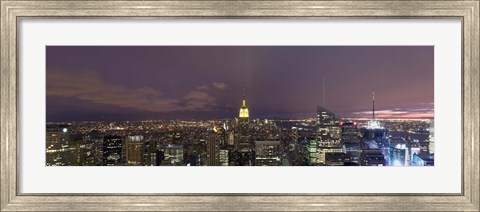 Framed Buildings in a city lit up at dusk, Midtown Manhattan, Manhattan, New York City, New York State, USA Print