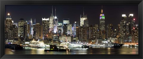 Framed Buildings in a city lit up at night, Hudson River, Midtown Manhattan, Manhattan, New York City, New York State, USA Print