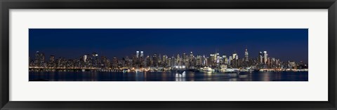 Framed Buildings in a city lit up at dusk, Hudson River, Midtown Manhattan, Manhattan, New York City, New York State, USA Print