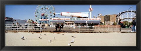 Framed Tourists at an amusement park, Coney Island, Brooklyn, New York City, New York State, USA Print