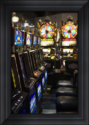 Framed Slot machines at an airport, McCarran International Airport, Las Vegas, Nevada, USA Print