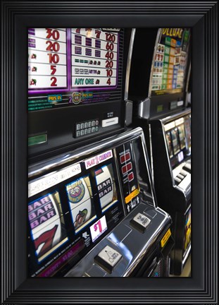 Framed Slot machines at an airport, McCarran International Airport, Las Vegas, Nevada, USA Print