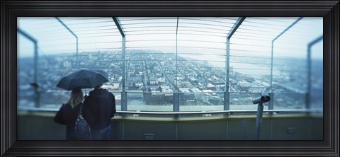 Framed Couple viewing a city from the Space Needle, Queen Anne Hill, Seattle, Washington State, USA Print