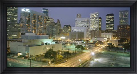 Framed Skyscrapers lit up at night, Houston, Texas Print