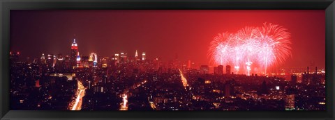 Framed Fireworks display at night over a city, New York City, New York State, USA Print