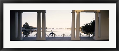 Framed Person stretching near colonnade, Lake Merritt, Oakland, Alameda County, California, USA Print