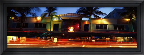 Framed Traffic in front of a building at dusk, Art Deco District, South Beach, Miami Beach, Miami-Dade County, Florida, USA Print
