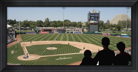 Framed Spectator watching a baseball match at stadium, Raley Field, West Sacramento, Yolo County, California, USA Print