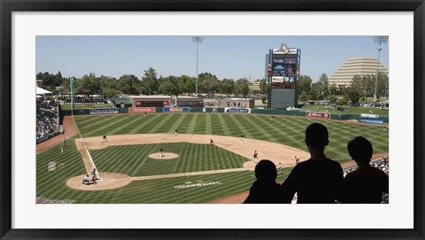 Framed Spectator watching a baseball match at stadium, Raley Field, West Sacramento, Yolo County, California, USA Print