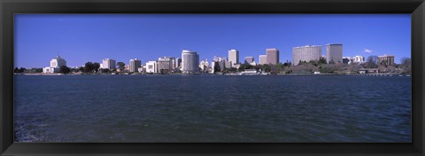 Framed Skyscrapers along a lake, Lake Merritt, Oakland, California, USA Print