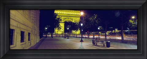 Framed France, Paris, Arc de Triomphe lit up at night Print