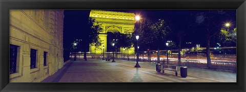 Framed France, Paris, Arc de Triomphe lit up at night Print