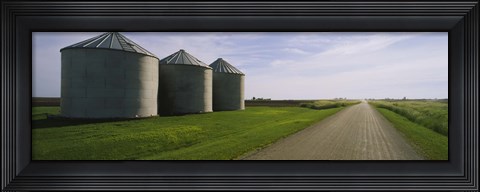 Framed Three silos in a field Print
