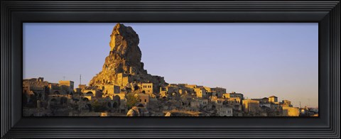Framed Low angle view of a rock formation in a village, Cappadocia, Turkey Print