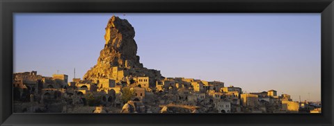 Framed Low angle view of a rock formation in a village, Cappadocia, Turkey Print