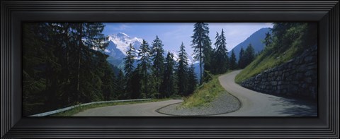 Framed Empty road passing through mountains, Bernese Oberland, Switzerland Print
