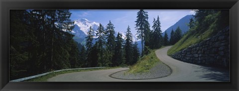 Framed Empty road passing through mountains, Bernese Oberland, Switzerland Print