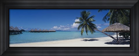Framed Lounge chair under a beach umbrella, Moana Beach, Bora Bora, French Polynesia Print