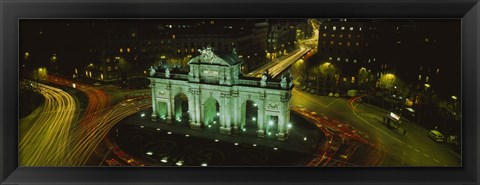 Framed High angle view of a monument lit up at night, Puerta De Alcala, Plaza De La Independencia, Madrid, Spain Print