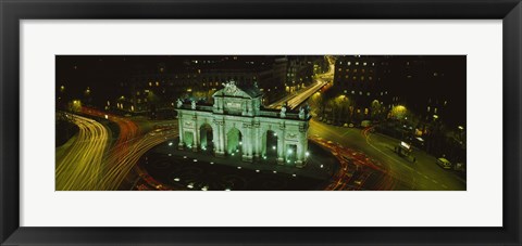 Framed High angle view of a monument lit up at night, Puerta De Alcala, Plaza De La Independencia, Madrid, Spain Print
