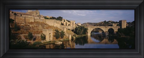 Framed Castle at the waterfront, Puente de San Martin, Tajo River, Toledo, Spain Print