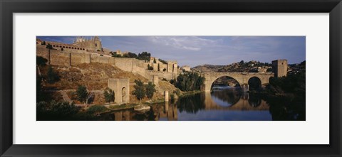 Framed Castle at the waterfront, Puente de San Martin, Tajo River, Toledo, Spain Print