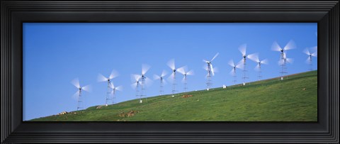 Framed Low angle view of wind turbines on a hill, Altamont Pass, California, USA Print