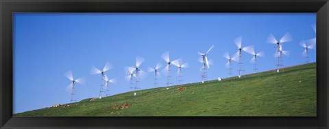 Framed Low angle view of wind turbines on a hill, Altamont Pass, California, USA Print