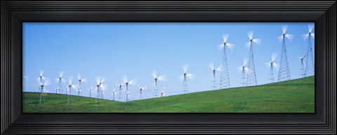 Framed Wind turbines spinning on hills, Altamont Pass, Livermore, California, USA Print