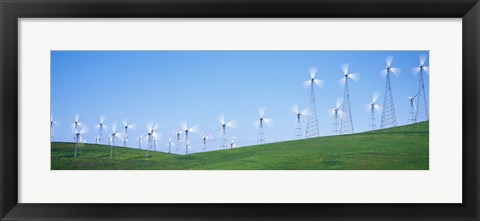 Framed Wind turbines spinning on hills, Altamont Pass, Livermore, California, USA Print
