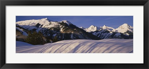 Framed Mountains covered with snow, Snowmass Mountain on left, Capitol Peak on right, Elk Mountains, Snowmass Village, Colorado, USA Print